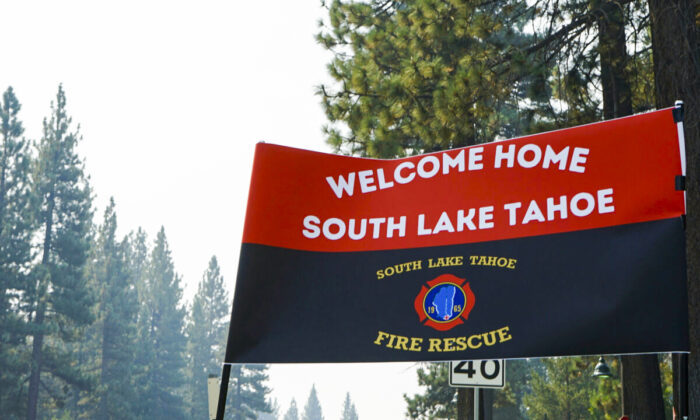A sign outside a Fire Station welcomes residents back to town after the lifting of the evacuation order at South Lake Tahoe, Calif., on Sept. 6, 2021. (Samuel Metz/AP Photo)