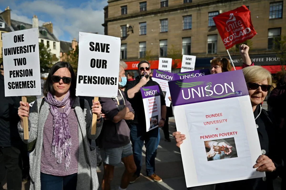 Staff from Dundee University hold a rally in City Square in Dundee, Scotland, on the first day of a five-day strike on Sept. 29, 2021. (Jeff J Mitchell/Getty Images)