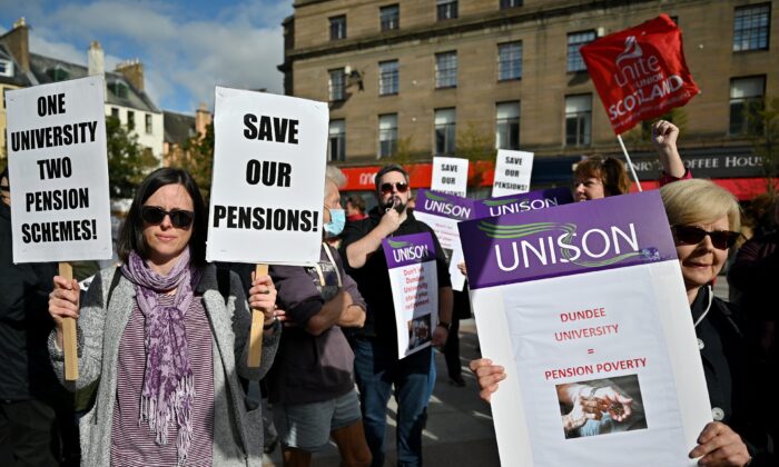 Staff from Dundee University hold a rally in City Square in Dundee, Scotland, on the first day of a five-day strike on Sept. 29, 2021. (Jeff J Mitchell/Getty Images)