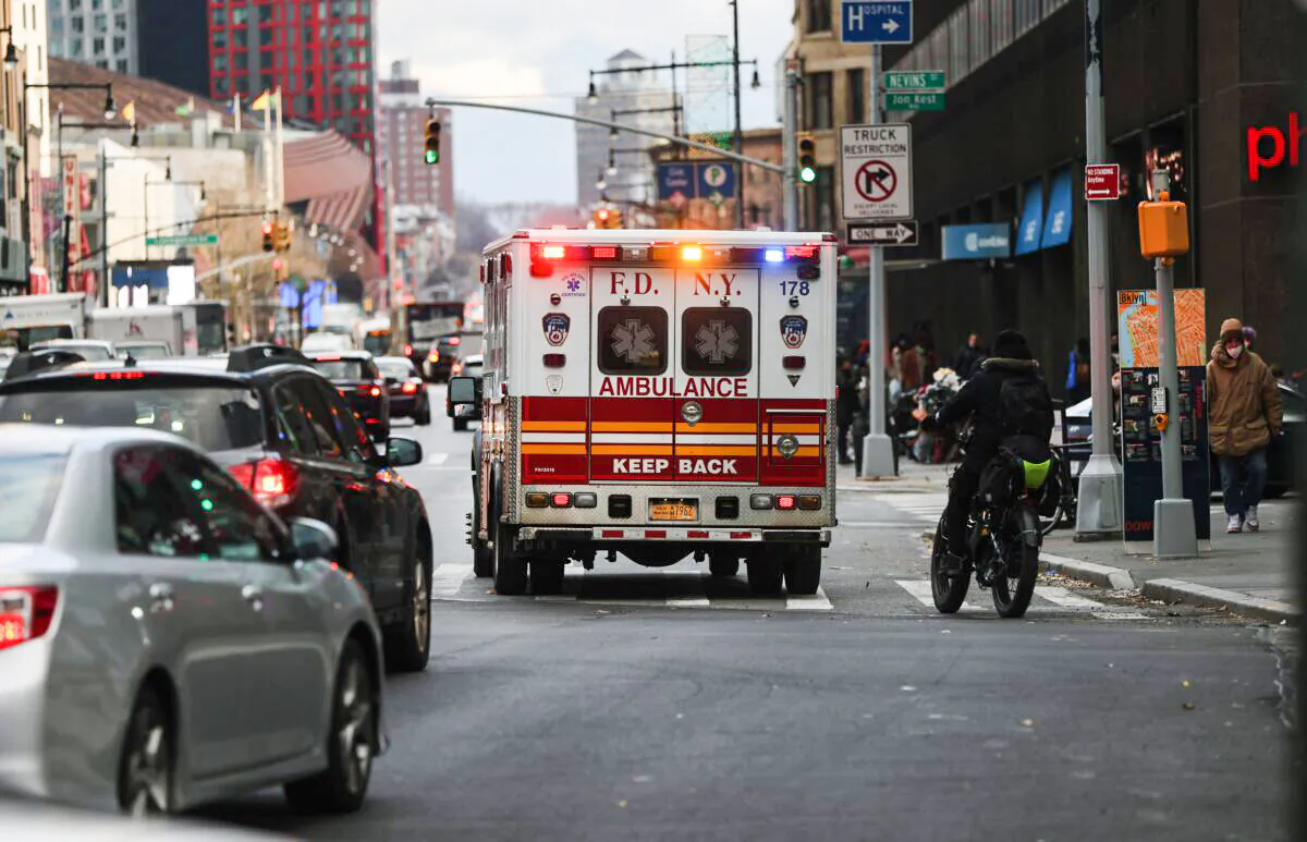 An ambulance drives down a road in Brooklyn, New York City, on Dec. 1, 2020. (Spencer Platt/Getty Images)
