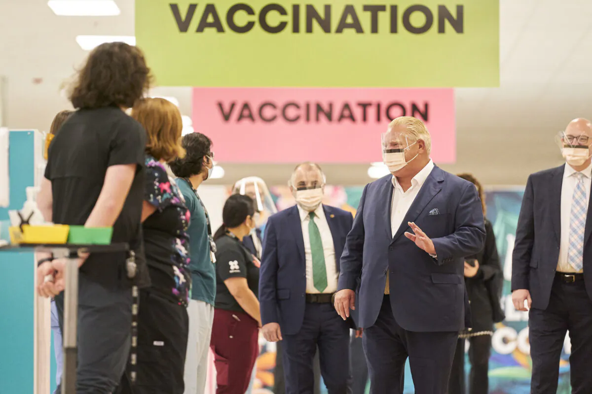 Ontario Premier Doug Ford tours a vaccination centre at the Devonshire Mall in Windsor, Ont. on Oct. 18, 2021. (The Canadian Press/ Geoff Robins)