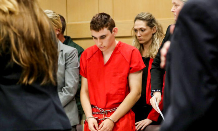Nikolas Cruz, facing 17 charges of premeditated murder in the mass shooting at Marjory Stoneman Douglas High School in Parkland, appears in court for a status hearing in Fort Lauderdale, Florida on Feb. 19, 2018. (Mike Stocker/Pool via Reuters)