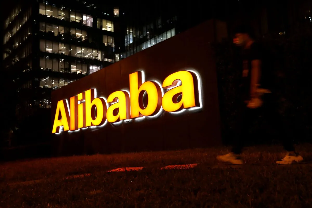 A logo of Alibaba Group is seen at its office building in Beijing, China, on August 9, 2021. (Tingshu Wang/Reuters