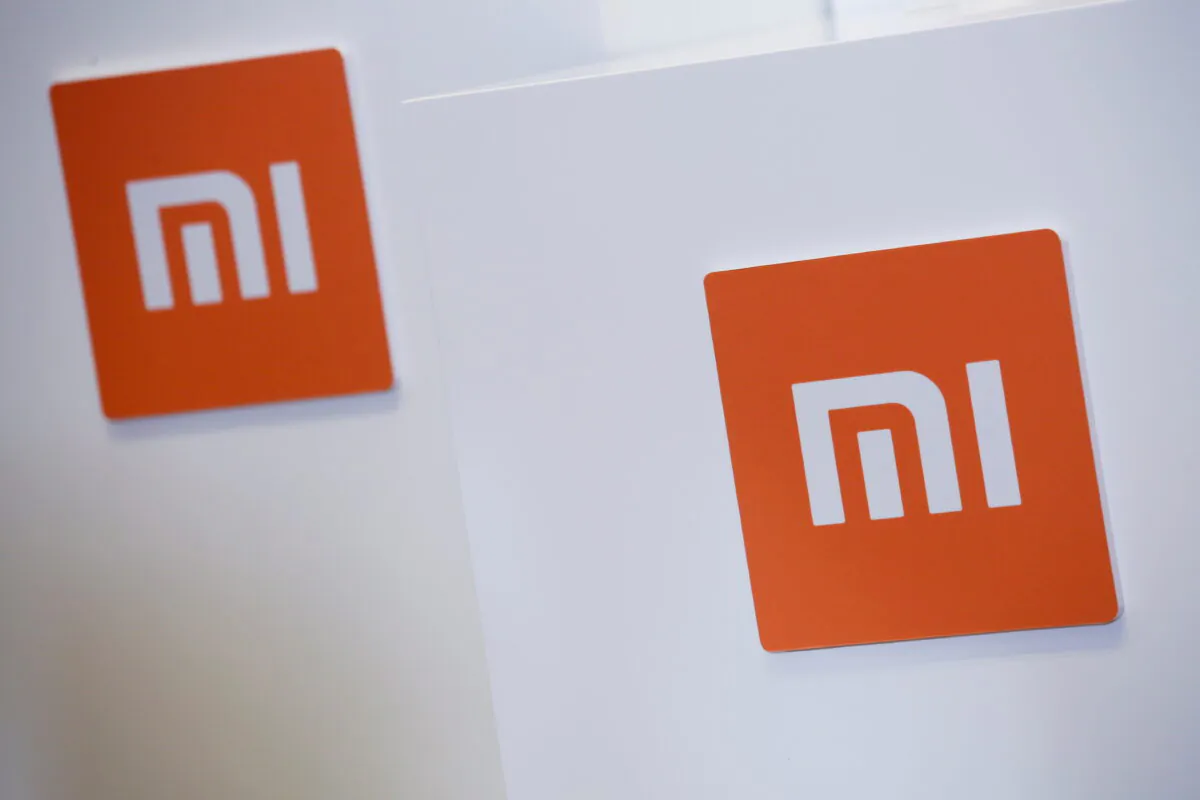 Xiaomi logos are seen in Hong Kong, China, on June 23, 2018. (Bobby Yip/Reuters)