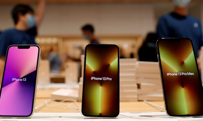 Apple's iPhone 13 models are pictured at an Apple Store in Beijing, China, on Sept. 24, 2021. (Carlos Garcia Rawlins/Reuters)