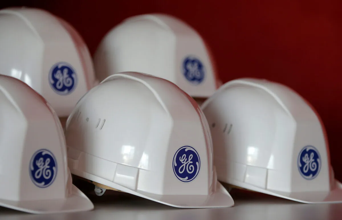 The General Electric logo is pictured on working helmets during a visit at the General Electric offshore wind turbine plant in Montoir-de-Bretagne, near Saint-Nazaire, western France, on Nov. 21, 2016. (Stephane Mahe/Reuters)