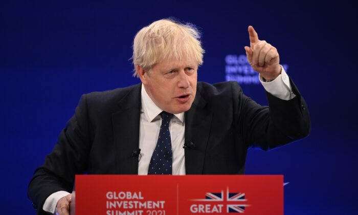Prime Minister Boris Johnson speaks during the Global Investment Summit at the Science Museum in London, on Oct. 19, 2021. (Leon Neal - WPA Pool /Getty Images)