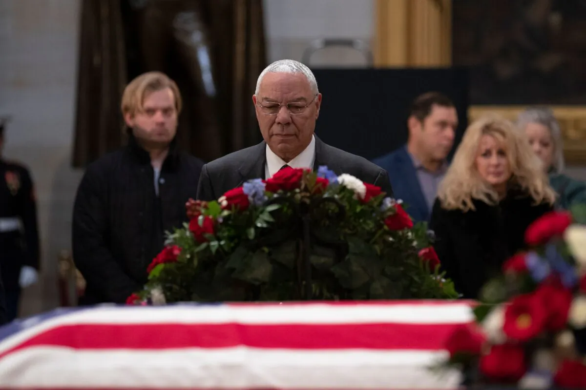 Former U.S. Secretary of State Colin Powell pays his respects as the remains of former President George H.W. Bush lie in state at the Capitol rotunda in Washington on Dec. 4, 2018. (Alex Edelman/AFP via Getty Images)