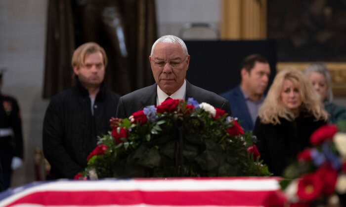Former U.S. Secretary of State Colin Powell pays his respects as the remains of former President George H.W. Bush lie in state at the Capitol rotunda in Washington on Dec. 4, 2018. (Alex Edelman/AFP via Getty Images)