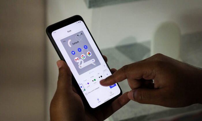 A man uses the new Google Pixel 4 smartphone during a Google launch event on Oct. 15, 2019, in New York City. (Drew Angerer/Getty Images)