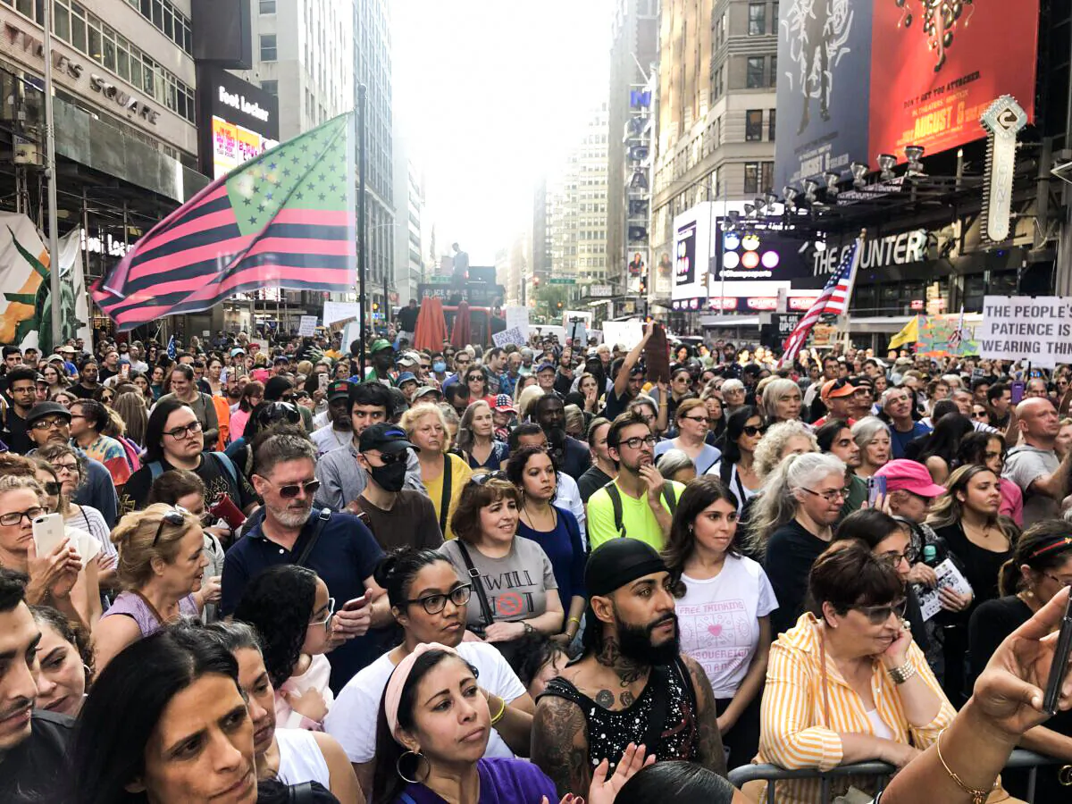 A crowd gathers at the Broadway Rally For Freedom in Manhattan, New York, on Oct. 16, 2021. (Enrico Trigoso/The Epoch Times)