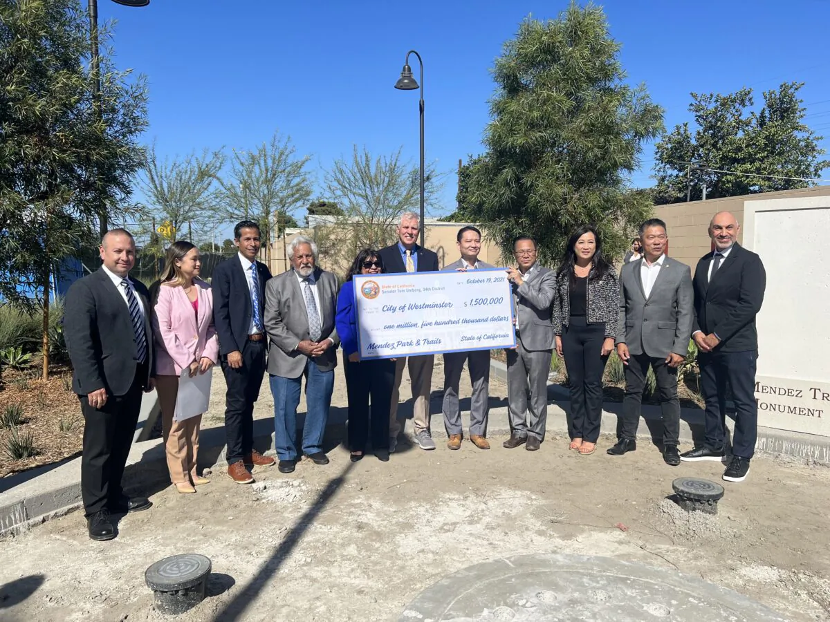 A $1.5 million check was given to the city of Westminster, Calif., on Oct. 19. (Drew Van Voorhis/The Epoch Times)