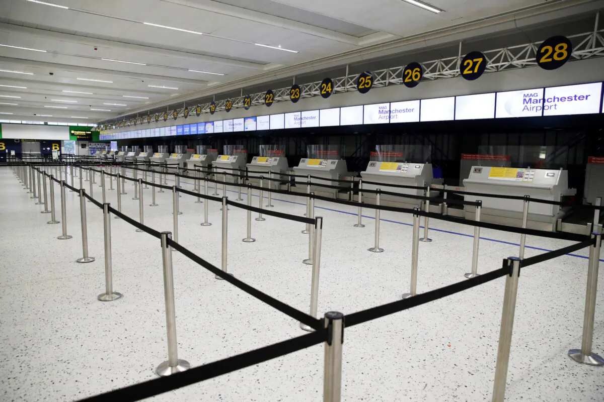 An empty check in area is seen at Manchester Airport in Manchester, UK, on June 8, 2020. (Phil Noble/Reuters)