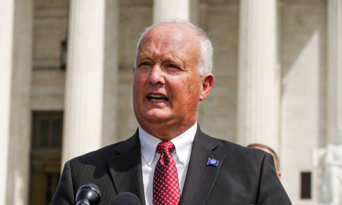 Nebraska Attorney General Doug Peterson speaks in front of the U.S. Supreme Court in Washington, Sept. 9, 2019. (Alex Wong/Getty Images)