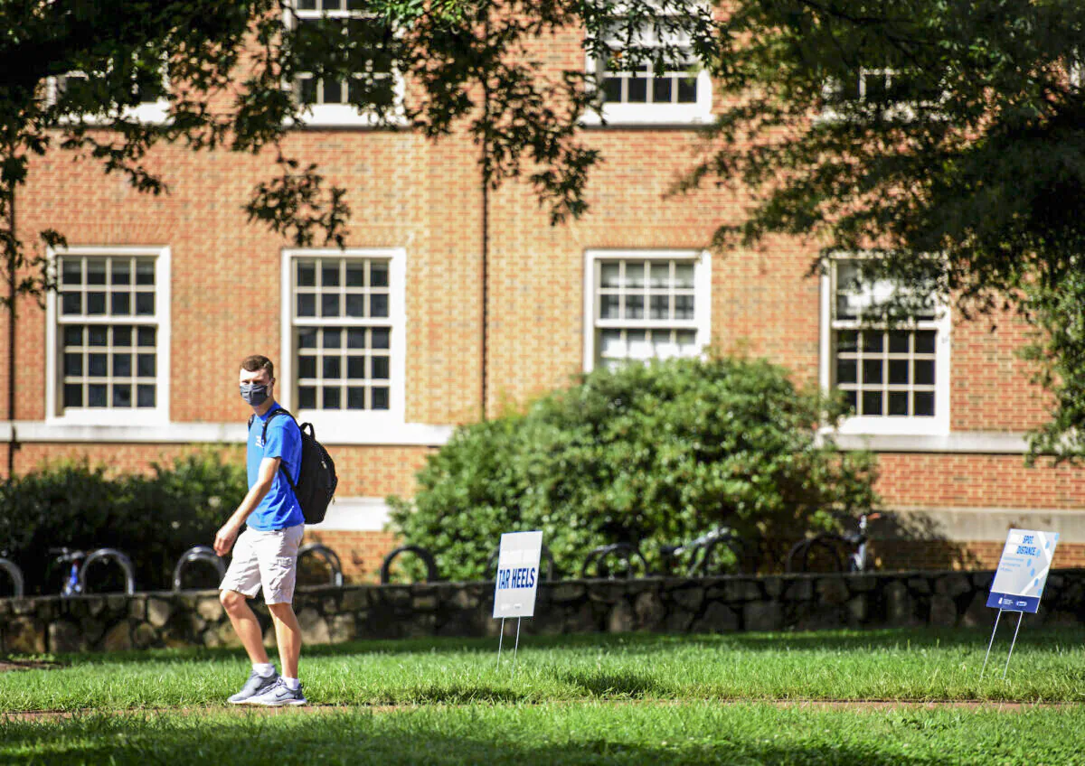 A student walks through the campus of the University of North Carolina at Chapel Hill in Chapel Hill, N.C., on Aug. 18, 2020. (Melissa Sue Gerrits/Getty Images)