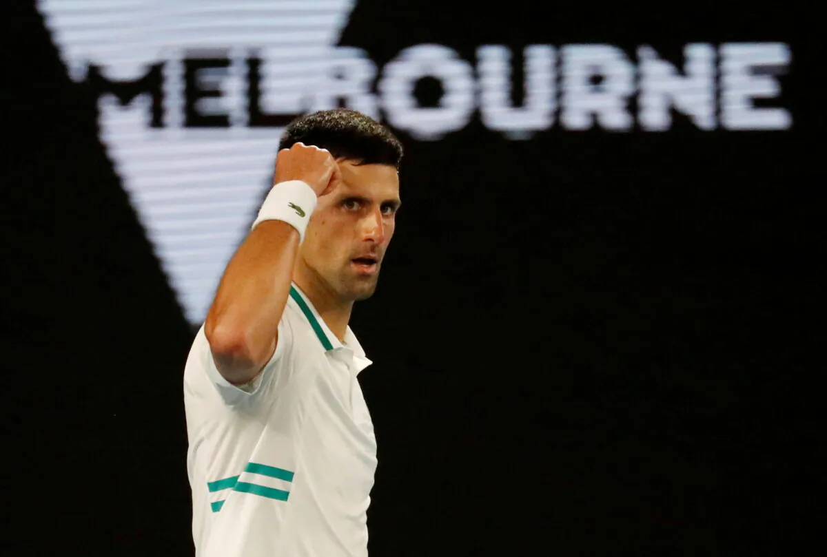 Serbia's Novak Djokovic reacts during his final match against Russia's Daniil Medvedev, at Melbourne Park, in Melbourne, Australia, on Feb. 21, 2021. (Asanka Brendon Ratnayake/Reuters)