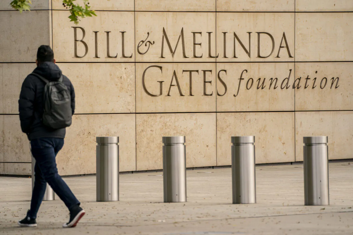 A pedestrian walks by the Bill & Melinda Gates Foundation in Seattle, Washington, on May 4, 2021. (David Ryder/Getty Images)