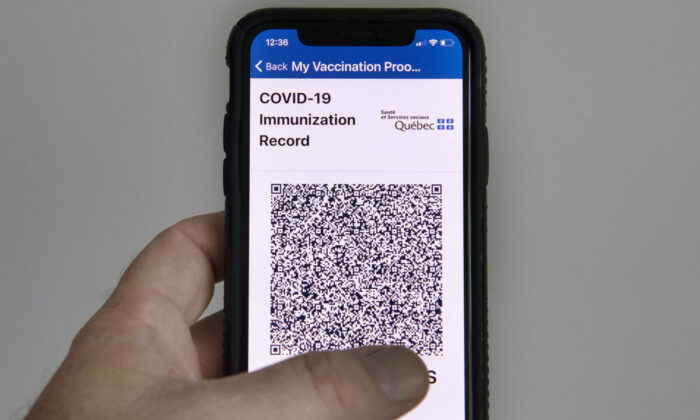 The Quebec government’s vaccine passport, called VaxiCode, is shown on a phone in Montreal on Aug. 25, 2021. (The Canadian Press/Graham Hughes)