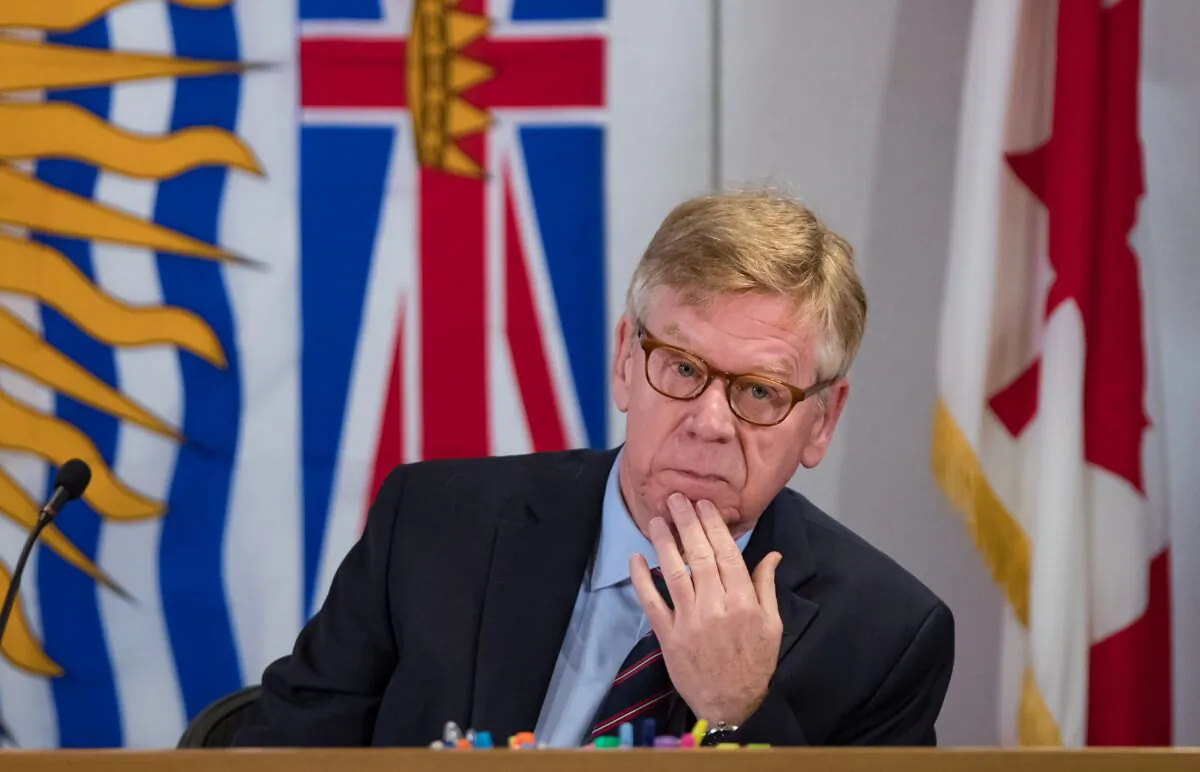 Commissioner Austin Cullen listens to introductions before opening statements at the Cullen Commission of Inquiry into Money Laundering in British Columbia, in Vancouver on Feb. 24, 2020. (The Canadian Press/Darryl Dyck)