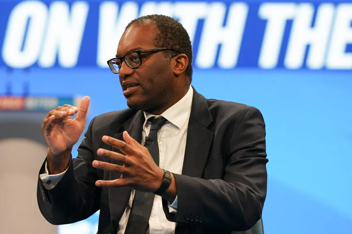 Kwasi Kwarteng, secretary of state for business, energy and industrial strategy, holds a discussion with Tees Valley Mayor Ben Houchen on the second day of the Conservative Party Conference in Manchester, on Oct. 4, 2021. (Ian Forsyth/Getty Images)