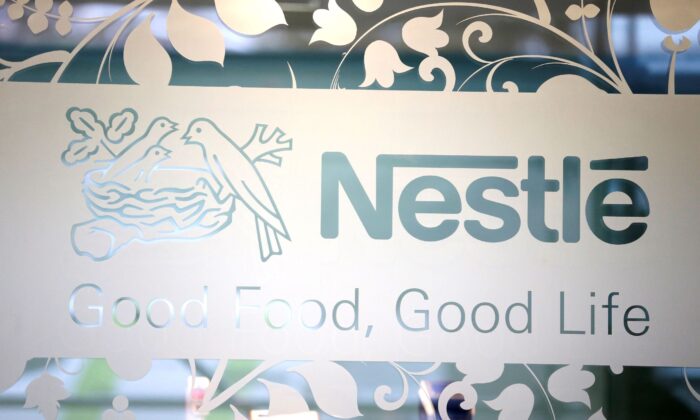 The Nestlé logo is painted on the door of the Nestlé headquarters supermarket in Vevey, Switzerland, on February 13, 2020.  (Pierre Albouy / Reuters)