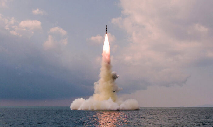 A new submarine-launched ballistic missile is seen during a test in this undated photo released by North Korea's Korean Central News Agency (KCNA) on Oct. 19, 2021. (KCNA via Reuters)