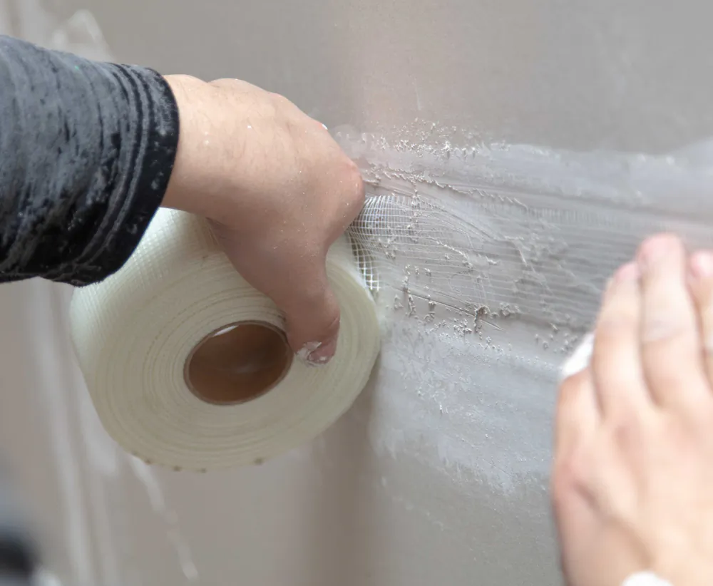 Anyone can nail drywall up to the studs, says James Dully, but it is a real art to finish it properly. (schankz/Shutterstock)