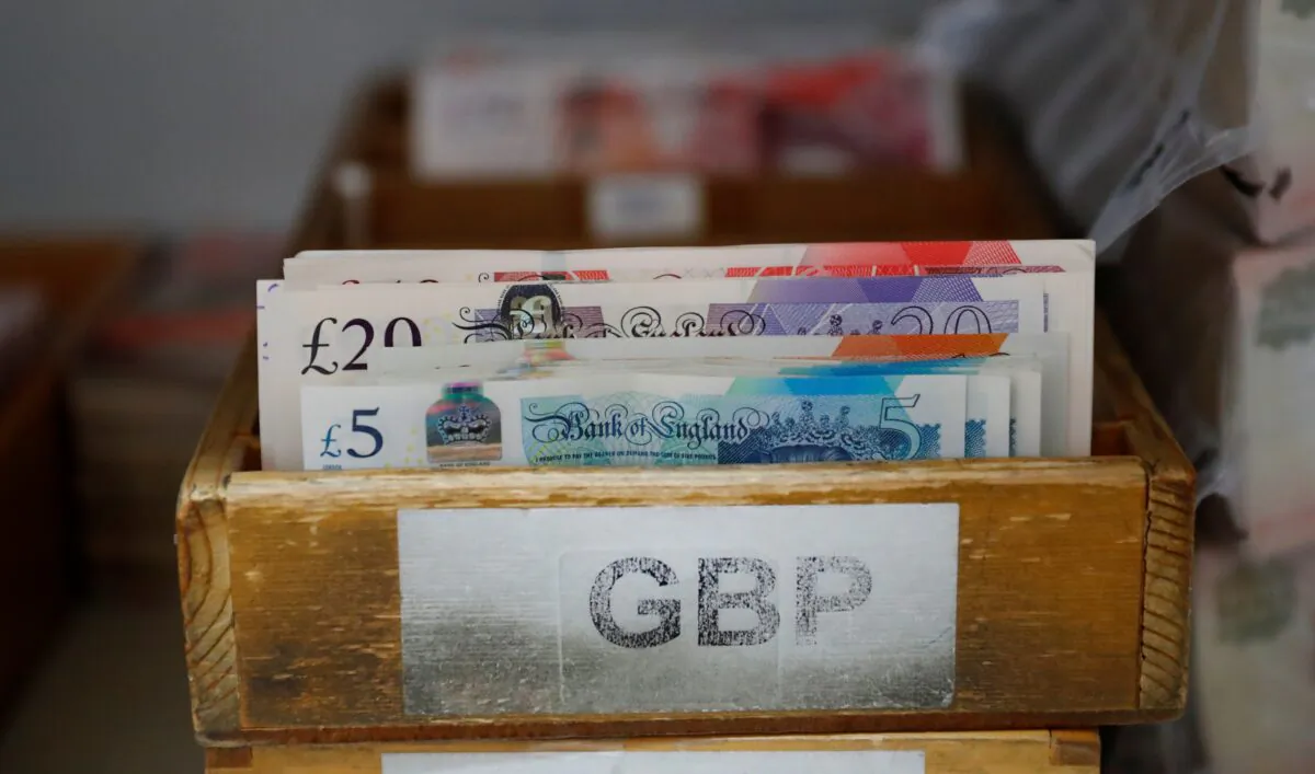 British Pound Sterling banknotes are seen in a box at the Money Service Austria company's headquarters in Vienna, Austria, on Nov. 16, 2017. (Leonhard Foeger/Reuters)