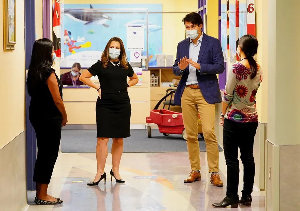 Prime Minister Justin Trudeau and Deputy Prime Minister Chrystia Freeland meet with doctors at the Children’s Hospital of Eastern Ontario, in Ottawa, on Oct. 21, 2021. (The Canadian Press/Sean Kilpatrick)
