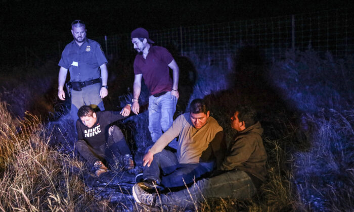 A group of illegal aliens is apprehended by law enforcement on a ranch in Kinney County, Texas, on Jan. 14, 2022. (Courtesy of Kinney County Sheriff's Office)