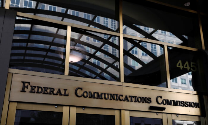 Signage is seen astatine  the office  of the Federal Communications Commission successful  Washington connected  Aug. 29, 2020. (Andrew Kelly/Reuters)