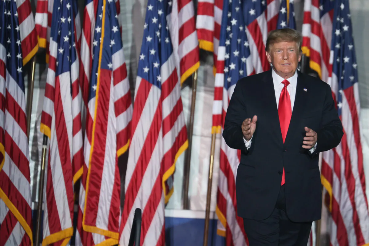 Former President Donald Trump arrives for a rally at the Iowa State Fairgrounds in Des Moines, Iowa, on Oct. 9, 2021. (Scott Olson/Getty Images)