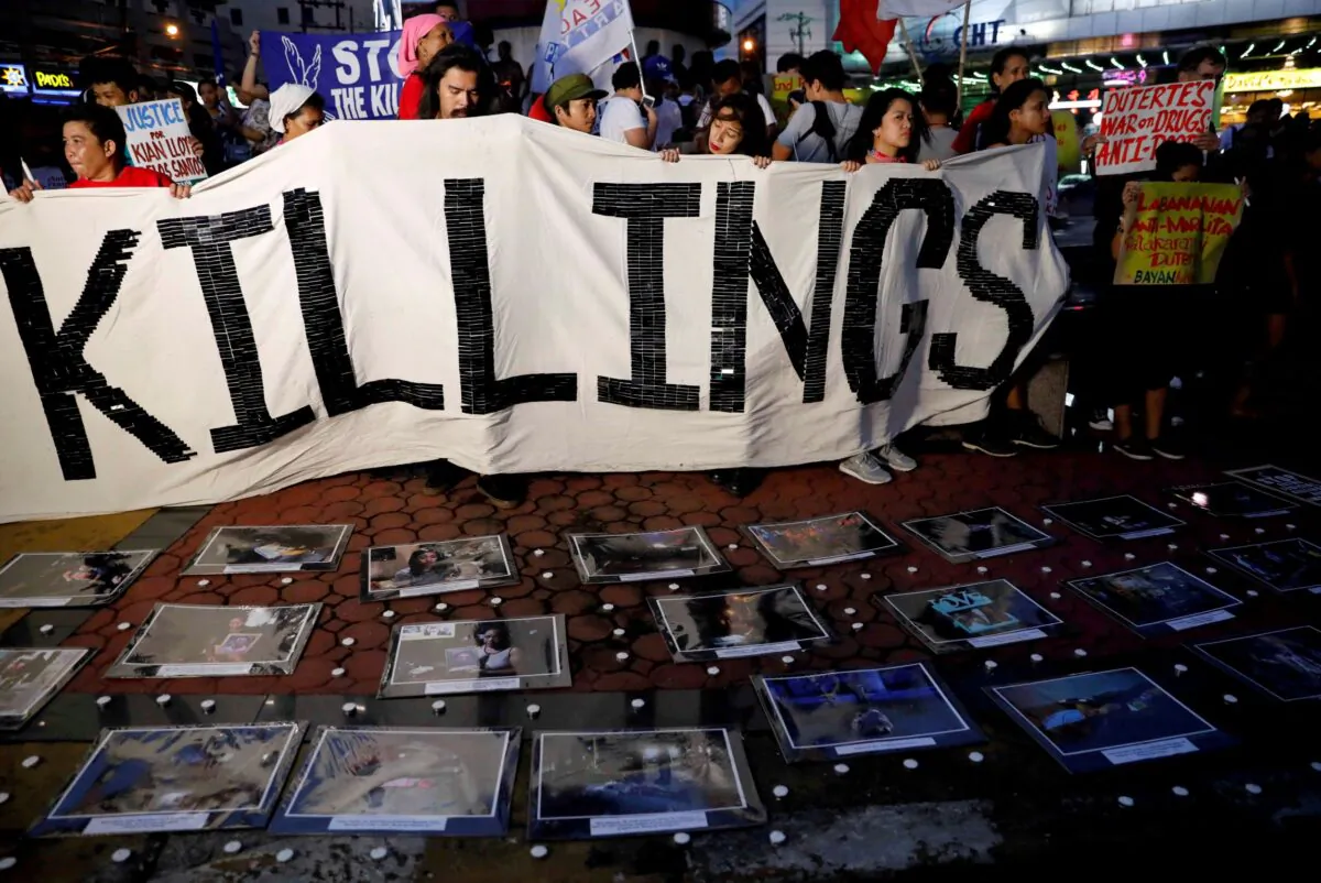 Activists take part in a rally protesting at an escalation of President Rodrigo Duterte's war on drugs, in Quezon City, Metro Manila, Philippines, on Aug. 18, 2017. (Dondi Tawatao/Reuters)