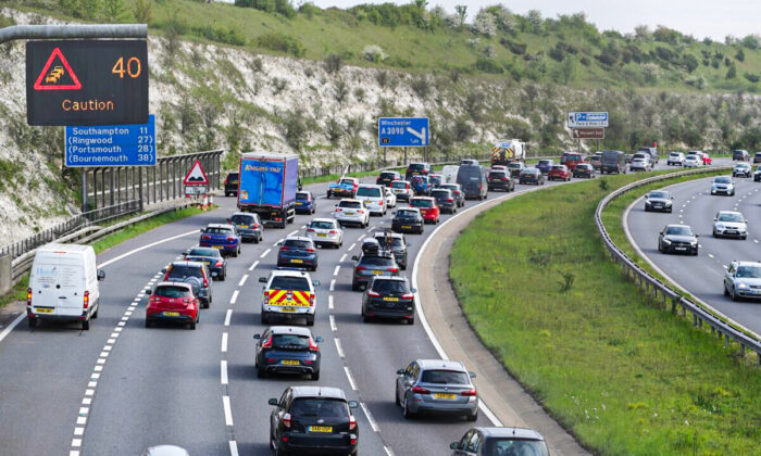 Traffic builds up   connected  the M3 southbound heading towards the coast, astatine  Winchester, successful  Hampshire, UK, connected  May 28, 2021. (Steve Parsons/PA)