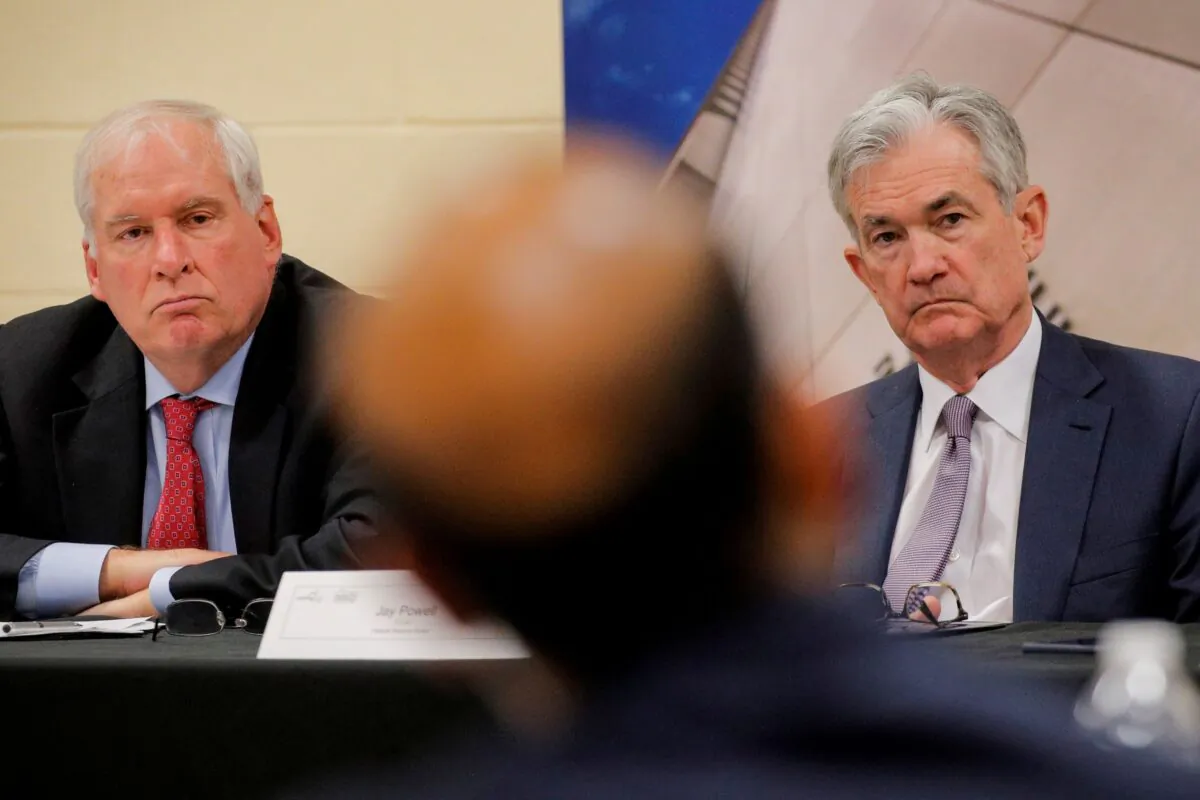Federal Reserve Chair Jerome Powell and then-Boston Fed President Eric Rosengren attend a presentation by the East Hartford CONNects, a Working Cities Challenge initiative, and community residents project at Silver Lane Elementary School in East Hartford, Conn., on Nov. 25, 2019. (Brendan McDermid/Reuters)