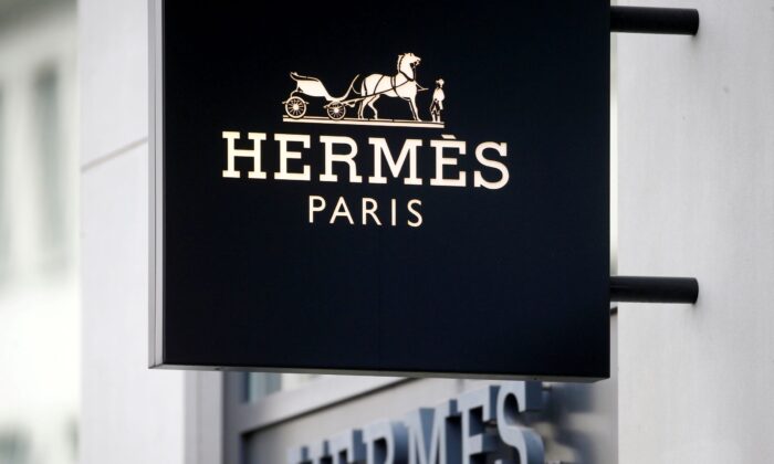  logo of French luxury group Hermes is seen at a store, as the spread of the coronavirus disease continues, in Zurich, Switzerland on Feb. 17, 2021. (Arnd Wiegmann/Reuters)