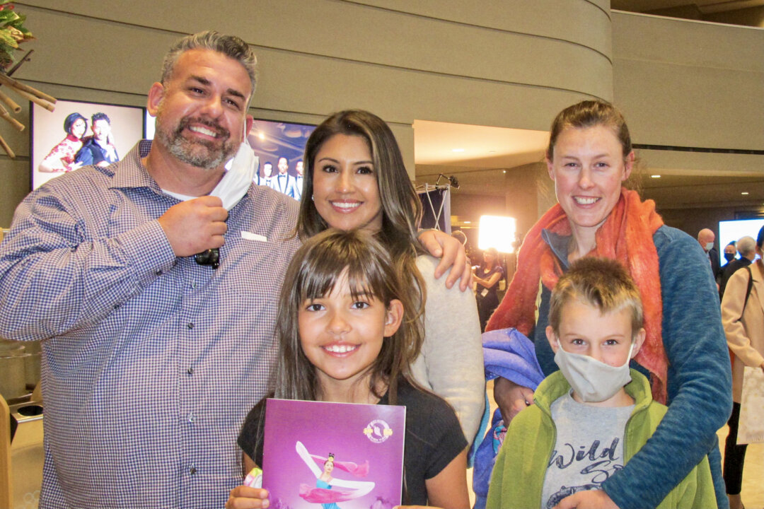 Gary Beaudette, Monica Beaudette (back C), their daughter (front C), and friends at the Shen Yun Performing Arts performance at Gallo Center for the Arts – Mary Stuart Rogers Theater, in Modesto, Calif., on Oct. 20, 2021. (Mary Mann/The Epoch Times)
