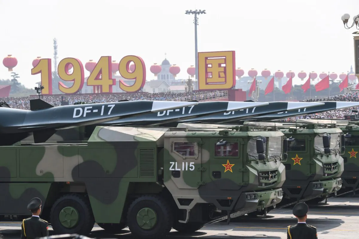 Chinese Communist Party Military vehicles carrying DF-17 hypersonic missiles participate in a military parade at Tiananmen Square in Beijing on Oct. 1, 2019. (Greg Baker/AFP via Getty Images)