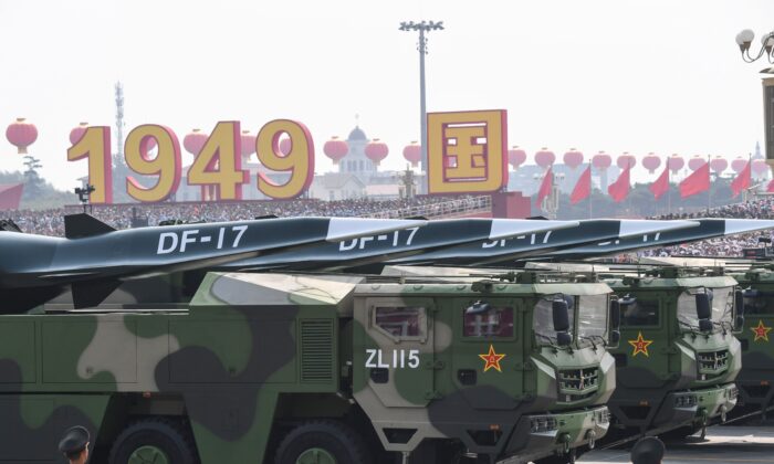 Chinese military vehicles carrying DF-17 missiles participate in a military parade at Tiananmen Square in Beijing, China, on Oct. 1, 2019. (Greg Baker/AFP via Getty Images)