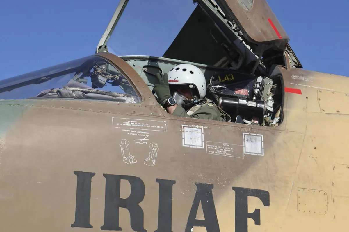 In this picture released by the official website of the Iranian Army, a pilot gestures during an air force exercise, in Iran, on Oct. 21, 2021. (Iranian Army via AP)