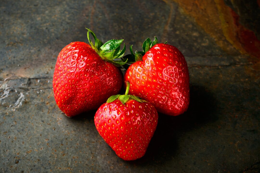 Three strawberries. (Jacek Dylag via Unsplash)