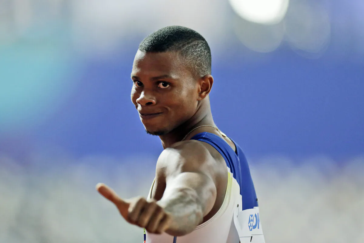Alex Quiñónez, of Ecuador, gestures after a men's 200 meter heat at the World Athletics Championships in Doha, Qatar, Sept. 29, 2019. (Petr David Josek/AP Photo)