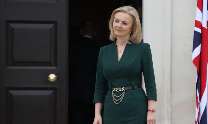 Britain's Foreign Secretary Liz Truss waits to greet three Baltic foreign ministers to Chevening House in Sevenoaks, south of London, on Oct. 11, 2021. (Hollie Adams /pool/AFP via Getty Images)