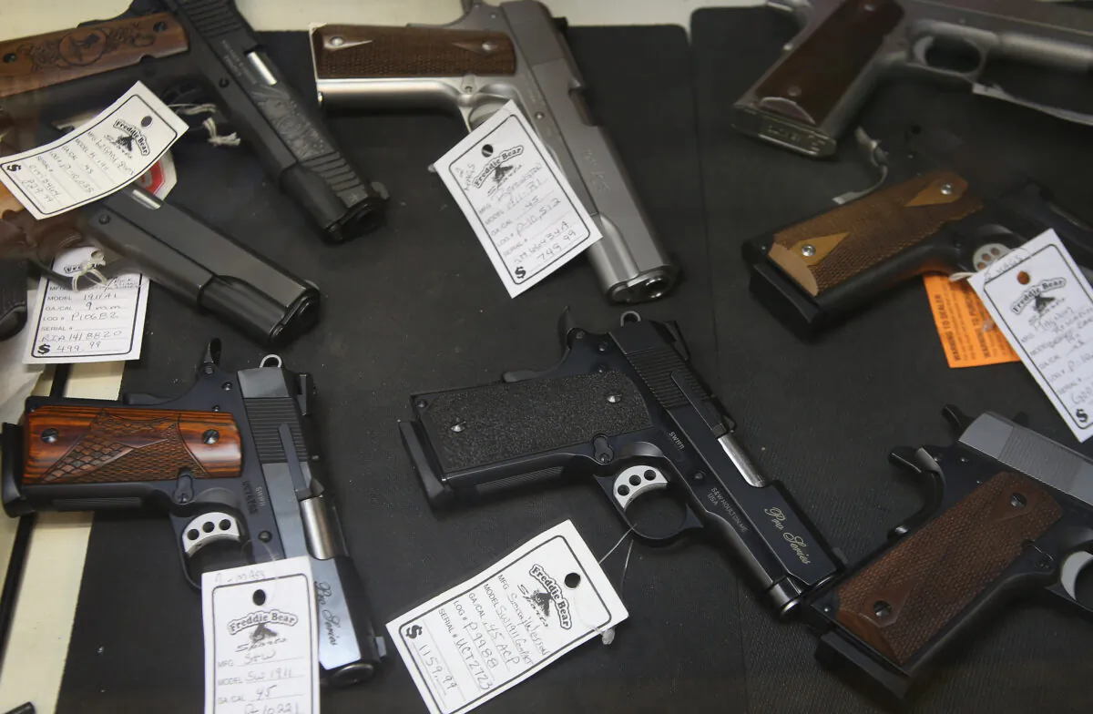 Pistols are offered for sale at Freddie Bear Sports in Tinley Park, Illinois, on Oct. 18, 2012. (Scott Olson/Getty Images)