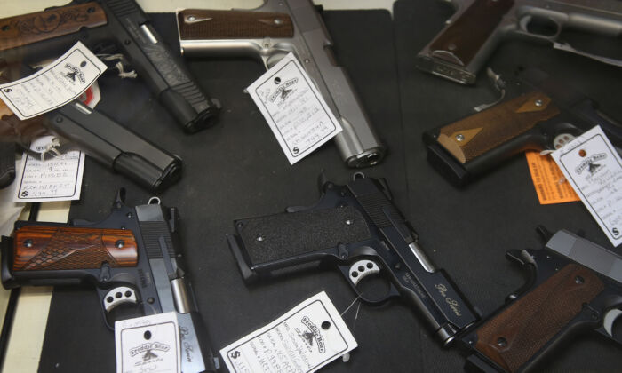 Pistols are offered for sale at Freddie Bear Sports in Tinley Park, Illinois, on Oct. 18, 2012. (Scott Olson/Getty Images)