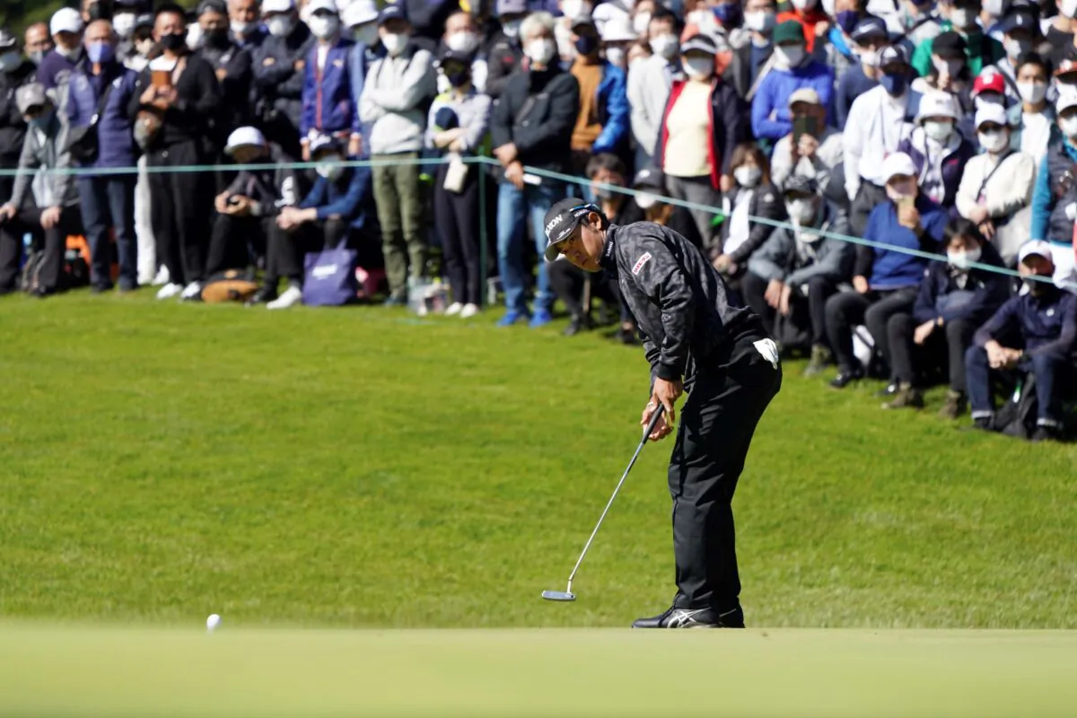 Hideki Matsuyama of Japan putts on the first green during the third round of the Zozo Championship golf tournament at Accordia Golf Narashino Country Club in Inzai, Chiba Prefecture, Japan on Oct. 23, 2021. (Tomohiro Ohsumi/AP Photo)