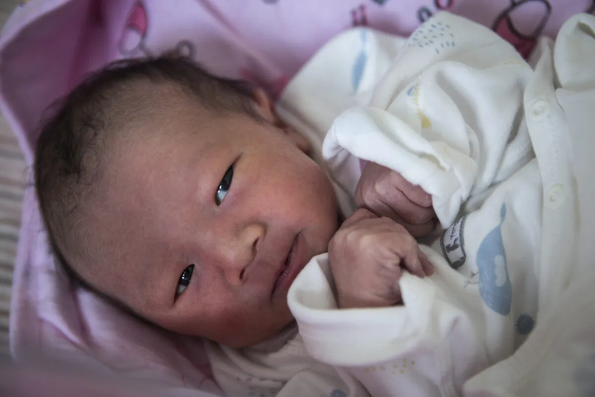  A newborn baby in a private obstetrics hospital on February 21, 2020 in Wuhan, Hubei Province, China. Due to the shortage of medical resources in Wuhan, many women choose to give birth in private hospitals. 
 (Getty Images)