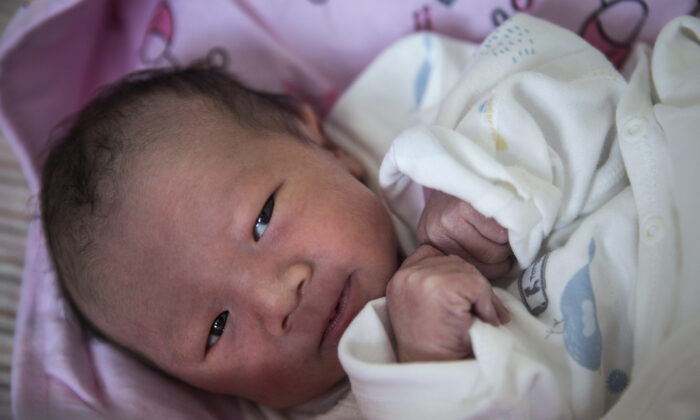  A newborn baby in a private obstetrics hospital on February 21, 2020 in Wuhan, Hubei Province, China. Due to the shortage of medical resources in Wuhan, many women choose to give birth in private hospitals. 
 (Getty Images)