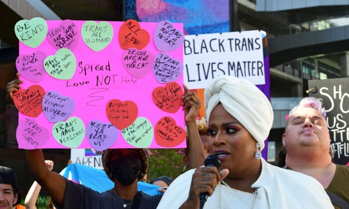 People rally in support of a Netflix transgender walkout protesting a Dave Chappelle comedy special, in Los Angeles on Oct. 20, 2021. (Frederic J. Brown/AFP via Getty Images)