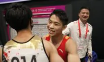 Hu Wins Horizontal Bar, Uchimura Shines at Gymnastics Worlds
